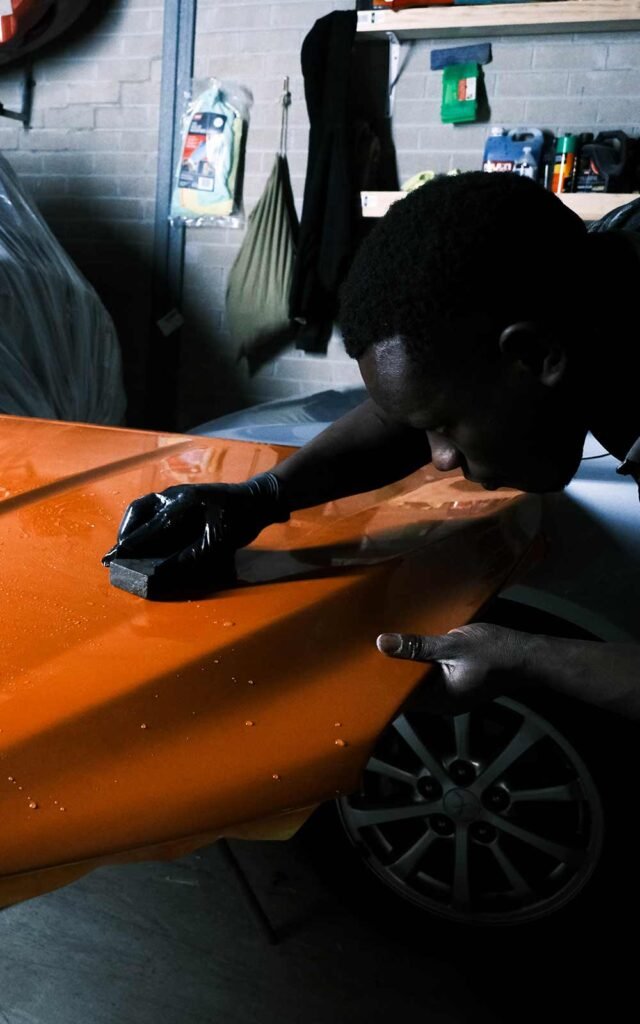 paint cleaning of a car hood